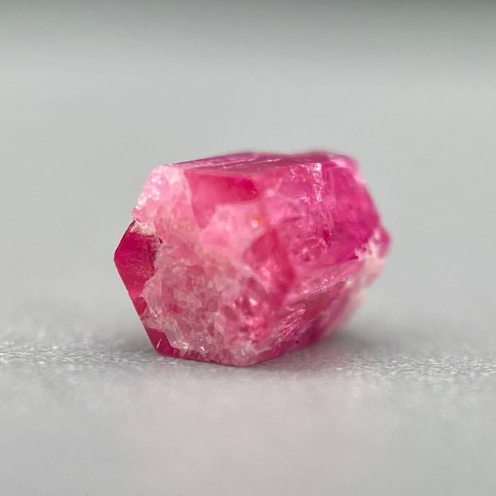 extremely rare red beryl (bixbite) crystal raspberry red hexagonal crystal of 0.56 carats available at sanctuaryofstones.com