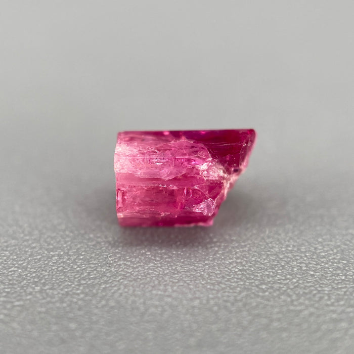 extremely rare red beryl (bixbite) crystal raspberry red hexagonal crystal of 0.56 carats available at sanctuaryofstones.com