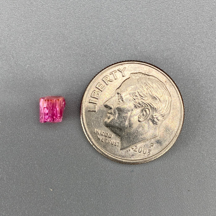 extremely rare red beryl (bixbite) crystal raspberry red hexagonal crystal of 0.58 carats available at sanctuaryofstones.com