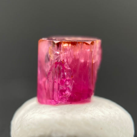 extremely rare red beryl (bixbite) crystal raspberry red hexagonal crystal of 0.58 carats available at sanctuaryofstones.com