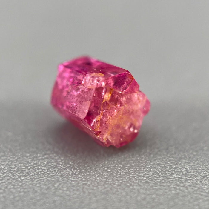 extremely rare red beryl (bixbite) crystal raspberry red hexagonal crystal of 0.58 carats available at sanctuaryofstones.com