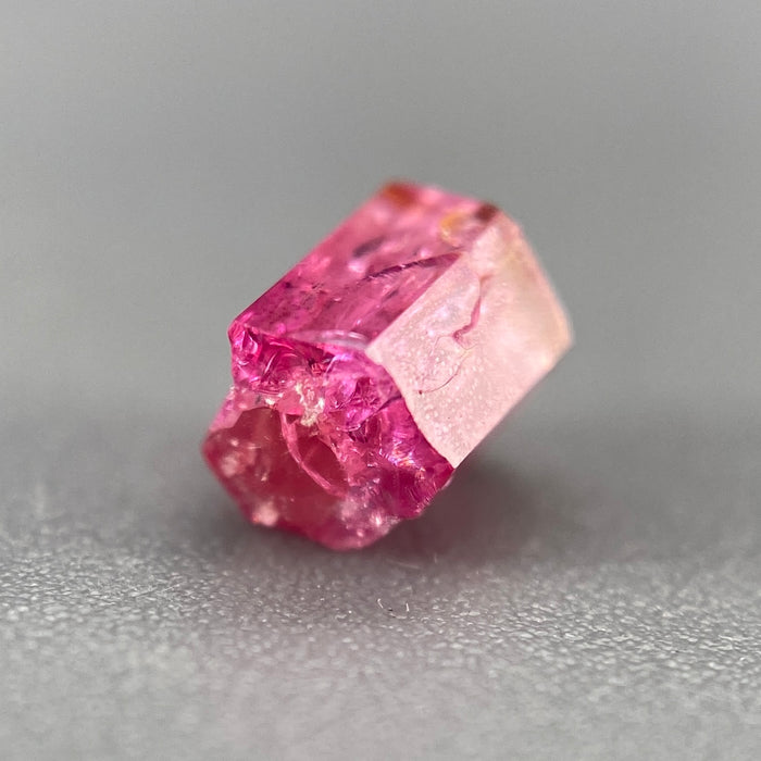 extremely rare red beryl (bixbite) crystal raspberry red hexagonal crystal of 0.58 carats available at sanctuaryofstones.com