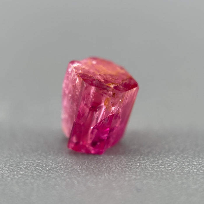 extremely rare red beryl (bixbite) crystal raspberry red hexagonal crystal of 0.58 carats available at sanctuaryofstones.com