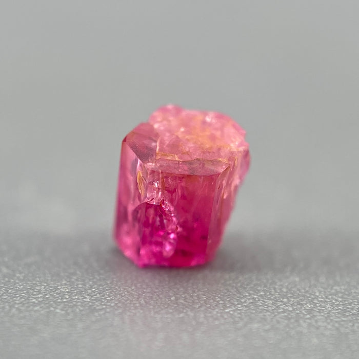 extremely rare red beryl (bixbite) crystal raspberry red hexagonal crystal of 0.58 carats available at sanctuaryofstones.com