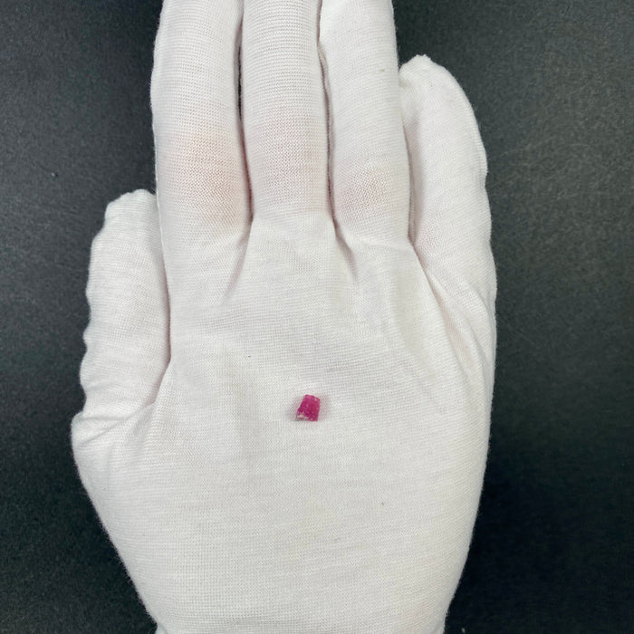Extremely rare red beryl crystal 0.59 carats, broken crystal shape, raspberry red color great translucency, available at sanctuaryofstones.com