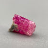 Extremely rare red beryl crystal 0.59 carats, broken crystal shape, raspberry red color great translucency, available at sanctuaryofstones.com