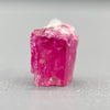 Extremely rare red beryl crystal 0.59 carats, broken crystal shape, raspberry red color great translucency, available at sanctuaryofstones.com
