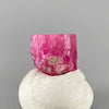 Extremely rare red beryl crystal 0.71 carats, hexagonal shape, raspberry red color great translucency, available at sanctuaryofstones.com