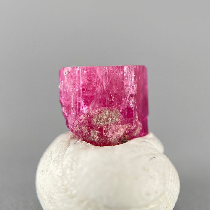 Extremely rare red beryl crystal 0.71 carats, hexagonal shape, raspberry red color great translucency, available at sanctuaryofstones.com