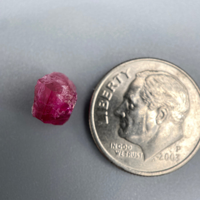  Extremely rare red beryl crystal 1.55 carats, broken but with two natural crystal faces, richest top-tier raspberry red color great translucency, available at sanctuaryofstones.com