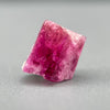Extremely rare red beryl crystal on matrix, 1.67 carats, two natural crystal faces, raspberry red color great translucency, available at sanctuaryofstones.com