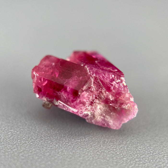Extremely rare red beryl twin crystal 2.22 carats, hexagonal shape twins, raspberry red color great translucency, available at sanctuaryofstones.com