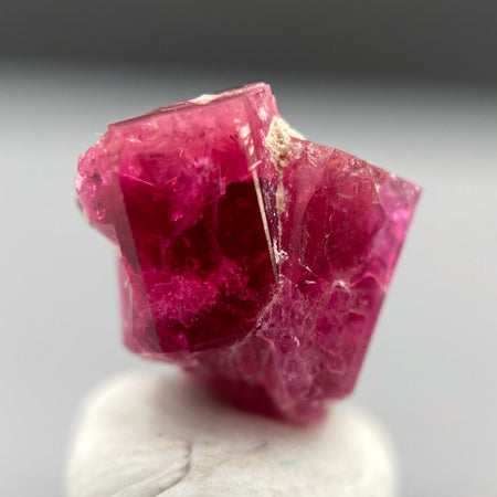 Extremely rare red beryl twin crystal 2.22 carats, hexagonal shape twins, raspberry red color great translucency, available at sanctuaryofstones.com