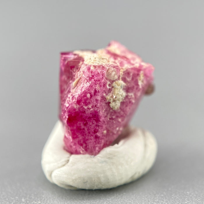 Extremely rare red beryl twin crystal 2.22 carats, hexagonal shape twins, raspberry red color great translucency, available at sanctuaryofstones.com