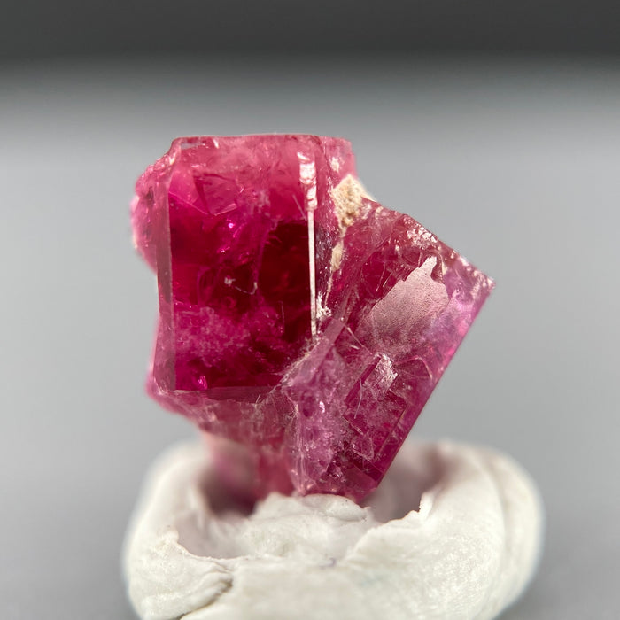 Extremely rare red beryl twin crystal 2.22 carats, hexagonal shape twins, raspberry red color great translucency, available at sanctuaryofstones.com