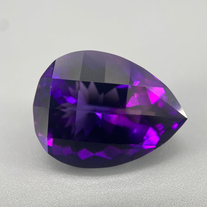 extra large rwandan amethyst pear cut gemstone unheated untreated 17.45 carats sanctuary of stones dot com