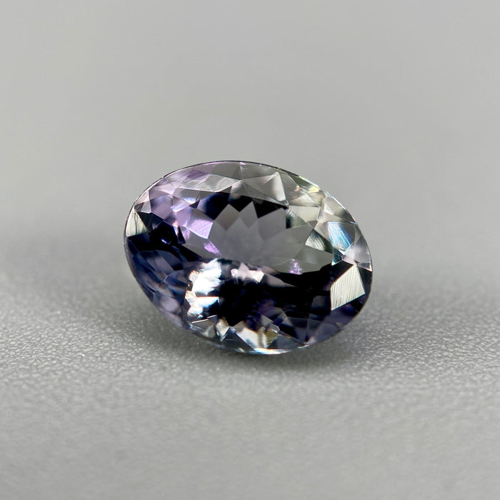 Unheated peacock tanzanite oval gemstone weighing 1.21 carats available on sanctuary of stones dot com photo 2