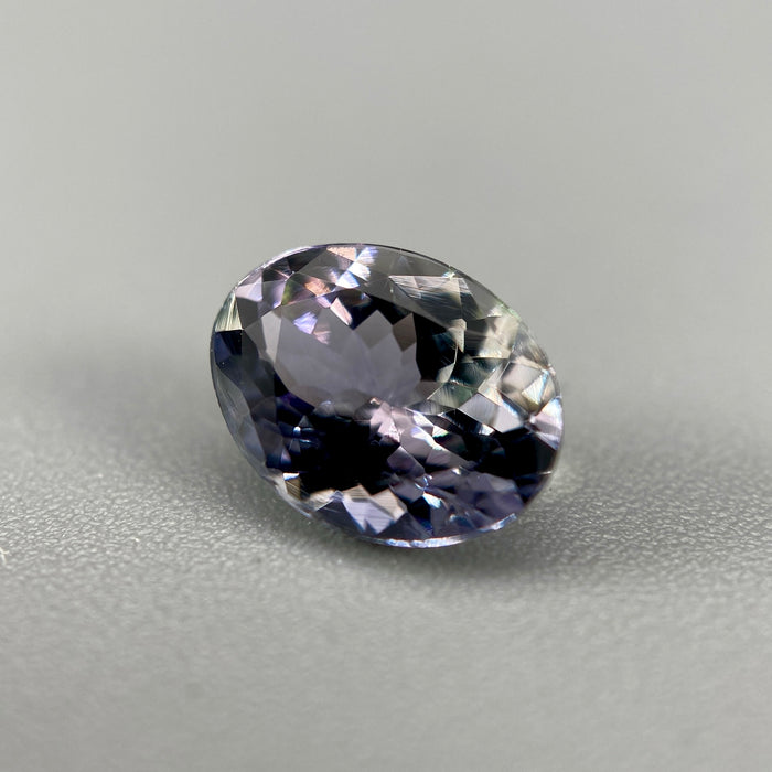 Unheated peacock tanzanite oval gemstone weighing 1.21 carats available on sanctuary of stones dot com photo 5