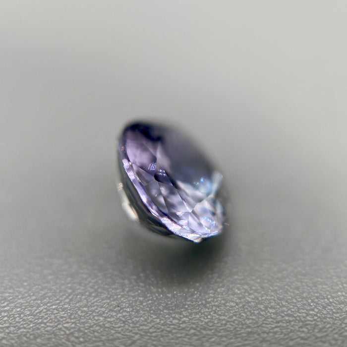 Unheated peacock tanzanite oval gemstone weighing 1.21 carats available on sanctuary of stones dot com photo 6