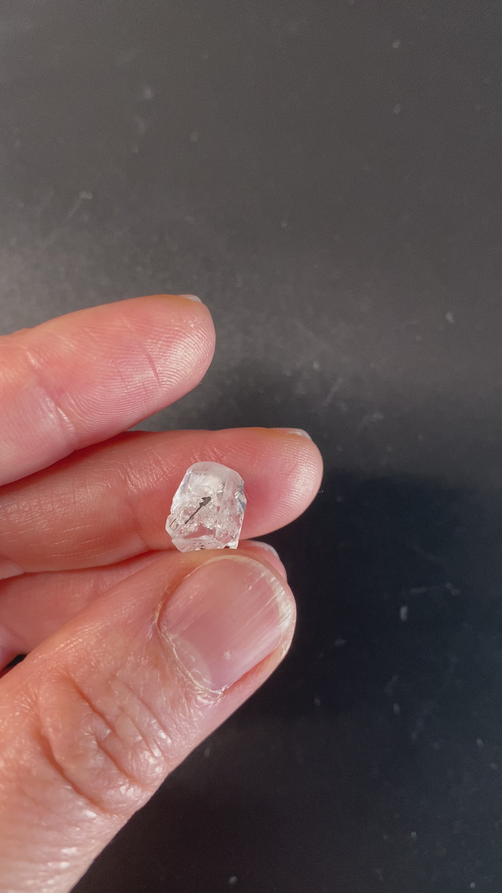 1 gram optically clear raw Madagascar phenakite crystal with tourmaline inclusions available at sanctuaryofstones.com