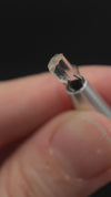 0.705 carat Burmese phenakite drill bit crystal for sale, glass clear, natural termination available at sanctuaryofstones.com video