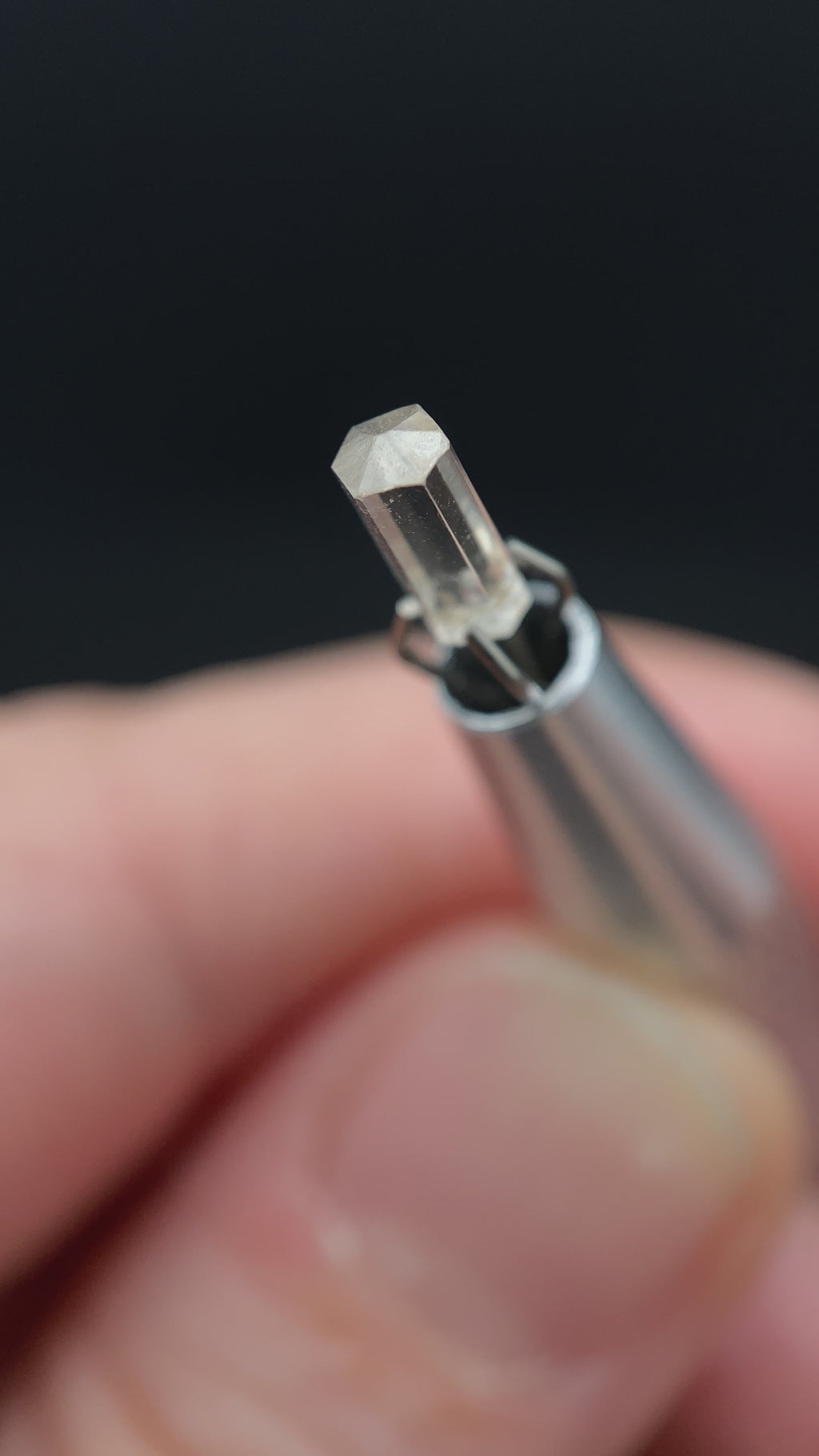 0.55 carat Burmese phenakite drill bit crystal for sale, glass clear, natural termination available at sanctuaryofstones.com video