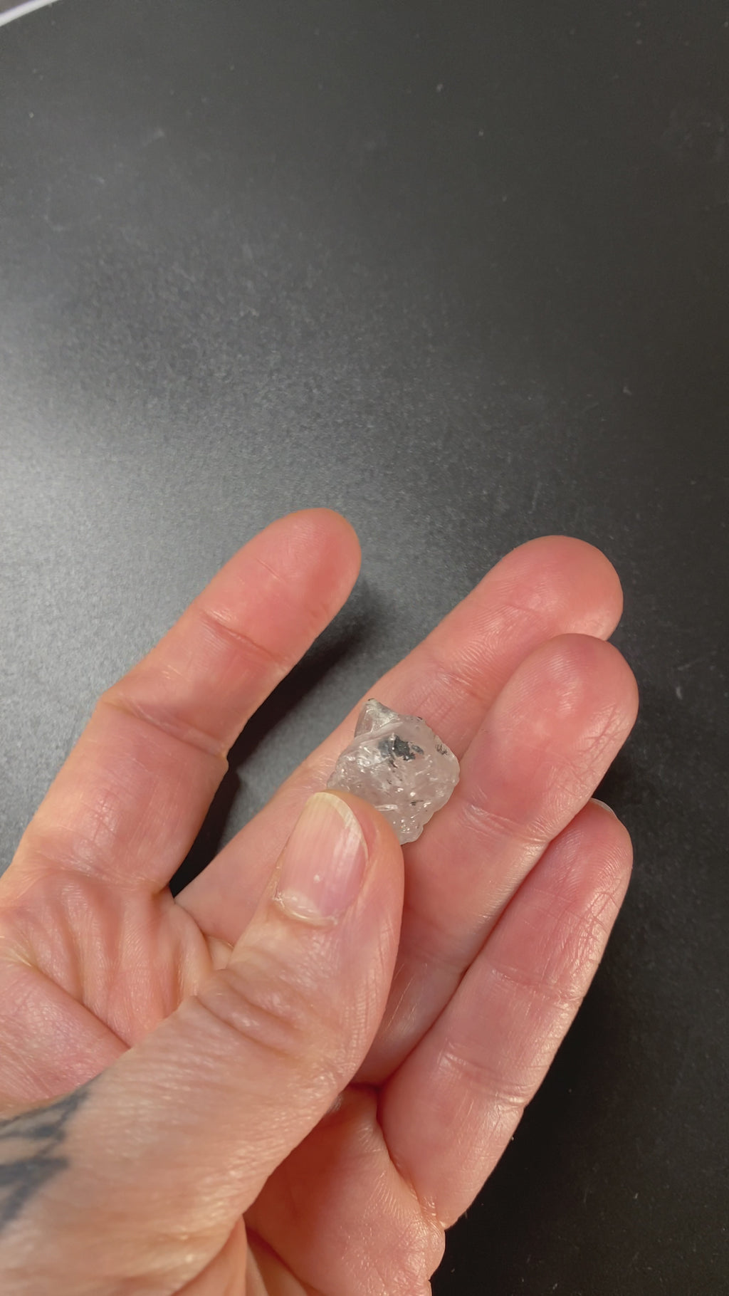 3.90 gram raw Madagascar phenakite crystal with tourmaline inclusions available at sanctuaryofstones.com