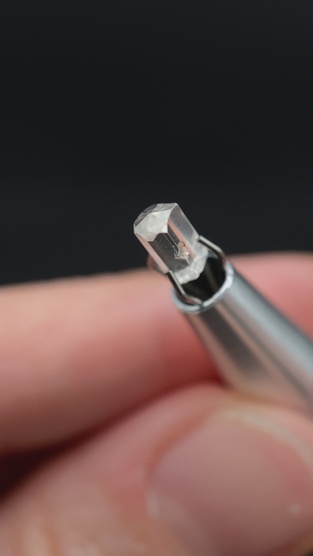 0.49 carat Burmese phenakite drill bit crystal for sale, glass clear, natural termination available at sanctuaryofstones.com video