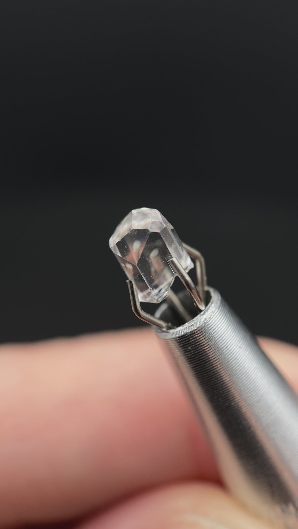 0.57 carat Burmese phenakite drill bit crystal for sale, glass clear, natural termination available at sanctuaryofstones.com video