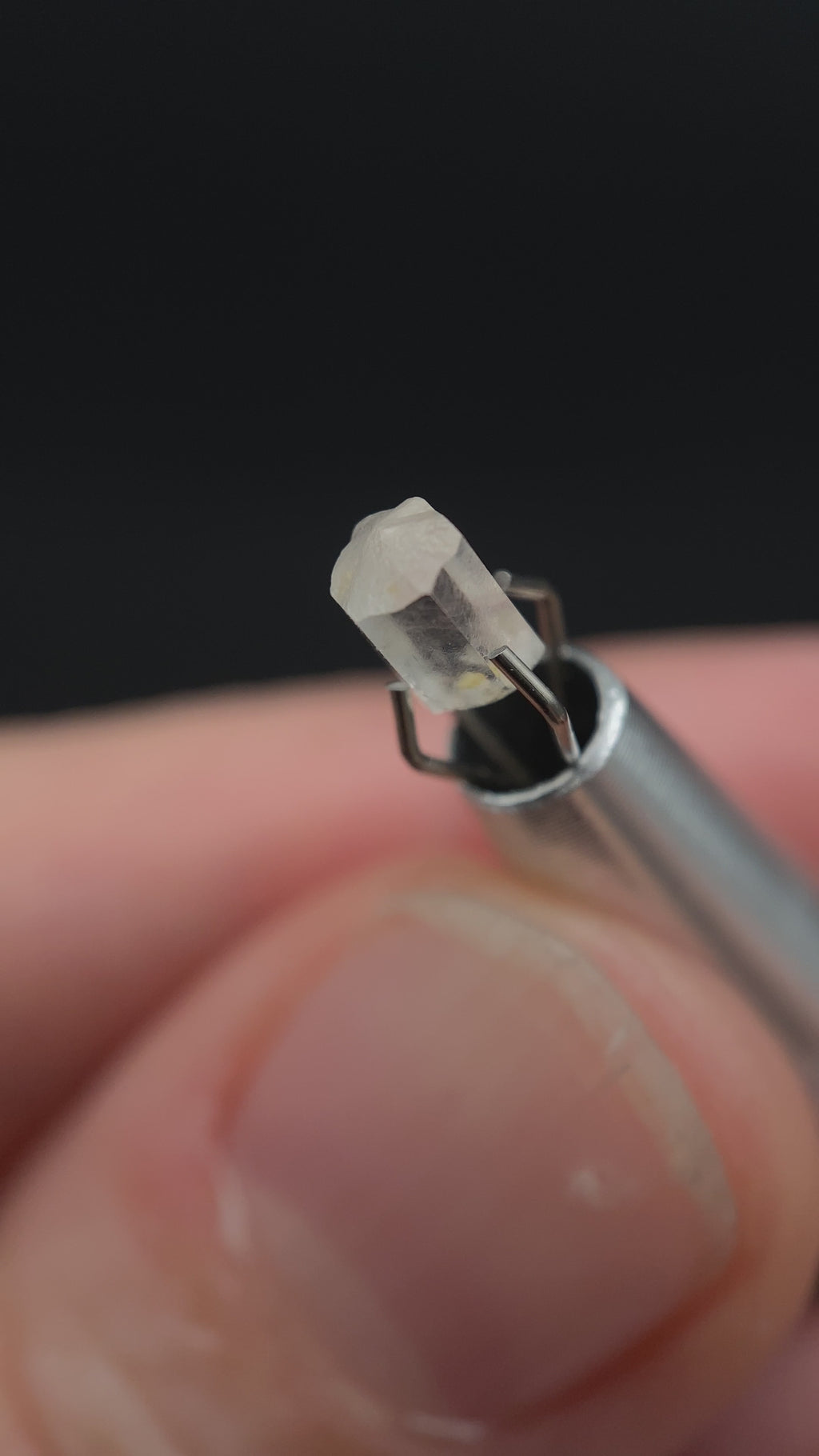 0.47 carat Burmese phenakite drill bit crystal for sale, glass clear, natural termination available at sanctuaryofstones.com video