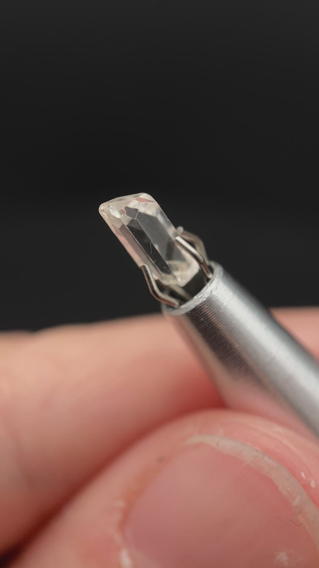 0.585 carat Burmese phenakite drill bit crystal for sale, glass clear, natural termination available at sanctuaryofstones.com video