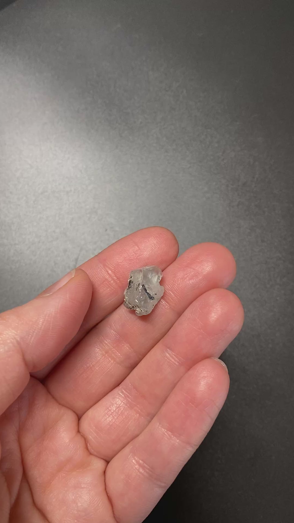 1.95 gram raw Madagascar phenakite crystal with a lot of tourmaline inclusions available at sanctuaryofstones.com