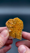 Large Mexican danburite crystal specimen with druzy quartz and golden calcite coating weighing 39.46 grams available on sanctuary of stones dot com video