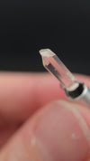 0.90 carat Burmese phenakite drill bit crystal for sale, glass clear, natural termination available at sanctuaryofstones.com video