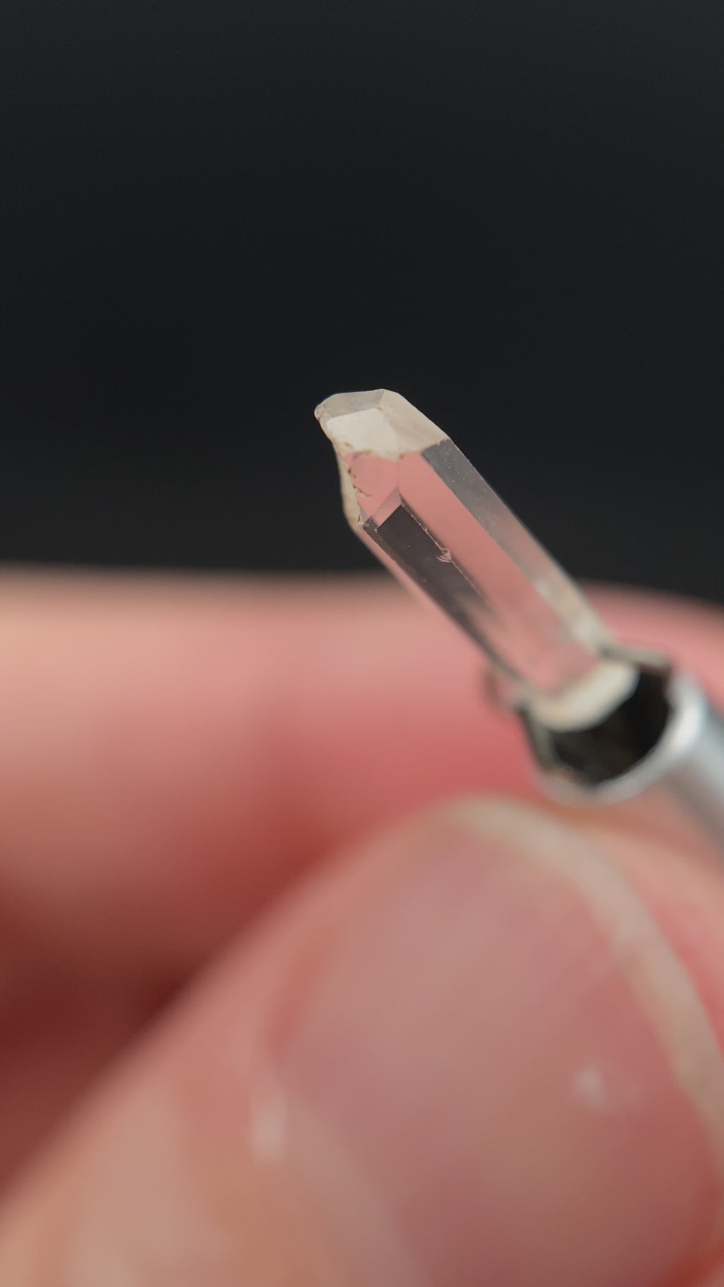 0.90 carat Burmese phenakite drill bit crystal for sale, glass clear, natural termination available at sanctuaryofstones.com video