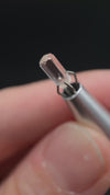 0.665 carat Burmese phenakite drill bit crystal for sale, glass clear, natural termination available at sanctuaryofstones.com video