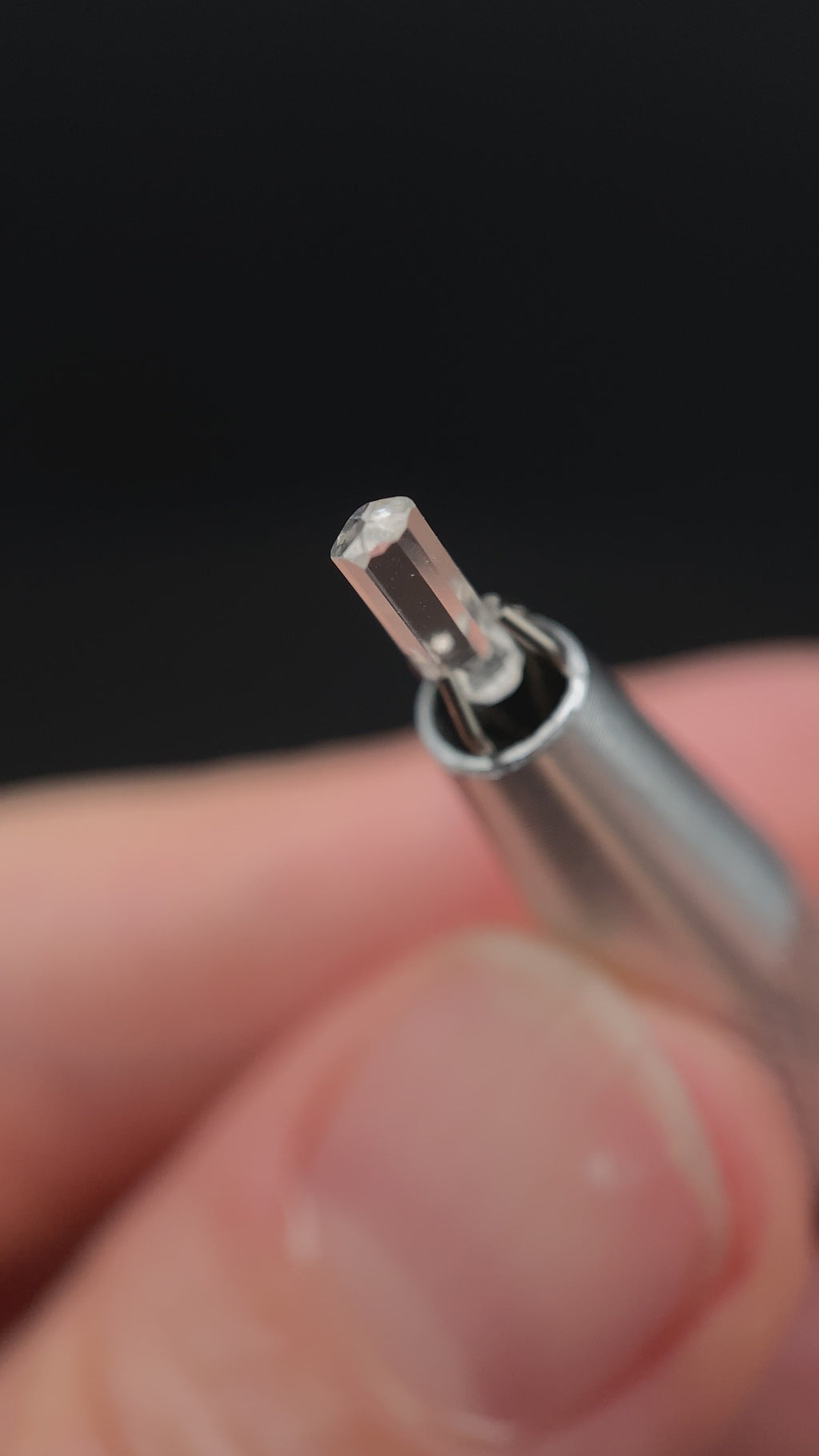 0.29 carat Burmese phenakite drill bit crystal for sale, glass clear, natural termination available at sanctuaryofstones.com video