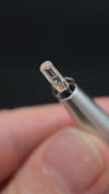 0.455 carat Burmese phenakite drill bit crystal for sale, glass clear, natural termination available at sanctuaryofstones.com video