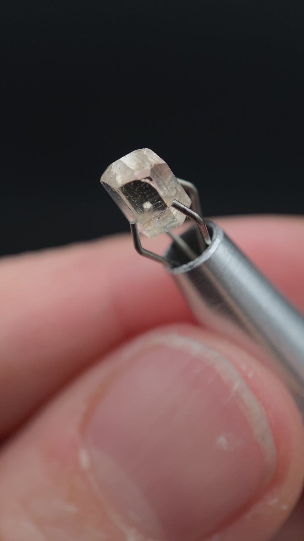 0.725 carat Burmese phenakite drill bit crystal for sale, glass clear, natural termination available at sanctuaryofstones.com video