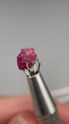 Extremely rare red beryl crystal 1.55 carats, broken but with two natural crystal faces, richest top-tier raspberry red color great translucency, available at sanctuaryofstones.com
