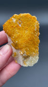 Large Mexican danburite crystal specimen with druzy quartz and golden calcite coating weighing 80.80 grams available on sanctuary of stones dot com video