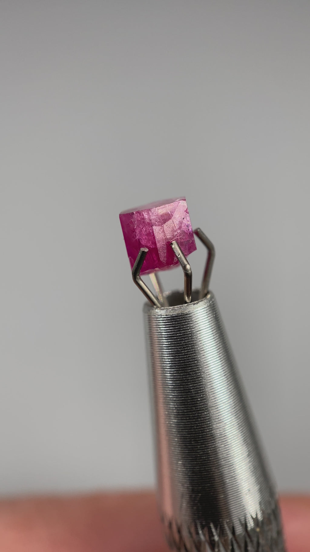 Extremely rare red beryl crystal 0.71 carats, hexagonal shape, raspberry red color great translucency, available at sanctuaryofstones.com