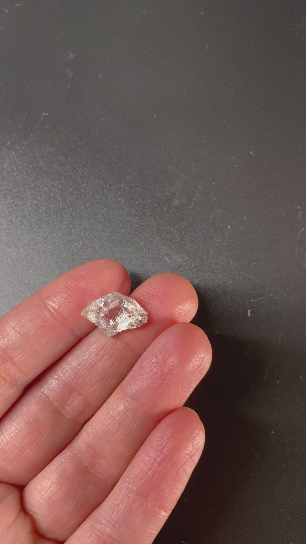1.27 gram raw Madagascar phenakite crystal with trace tourmaline available at sanctuaryofstones.com