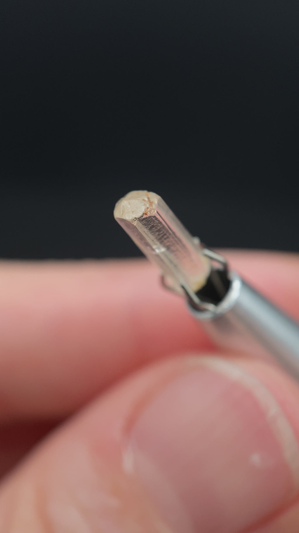 0.92 carat Burmese phenakite drill bit crystal for sale, glass clear, natural termination available at sanctuaryofstones.com video