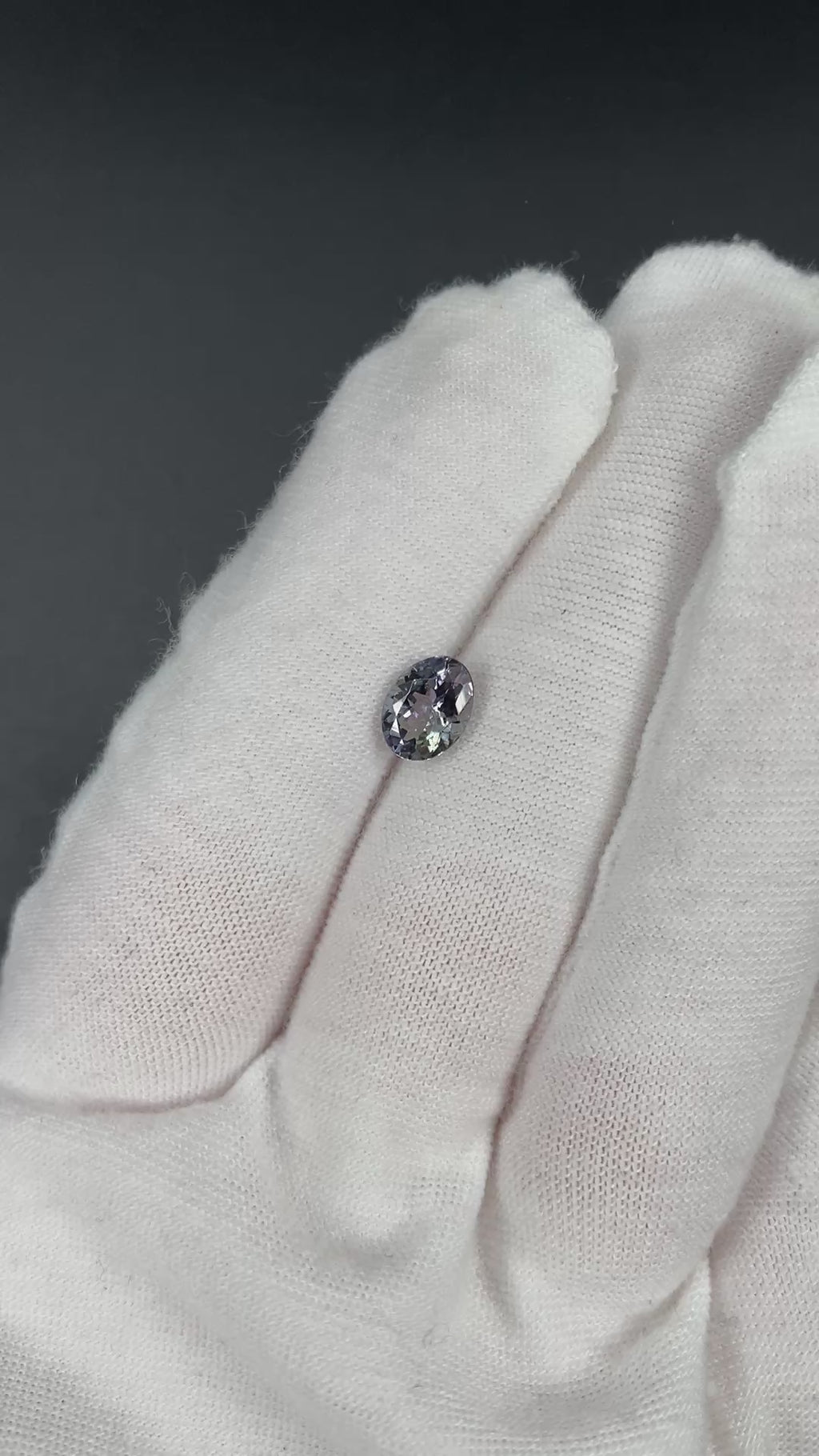 Unheated peacock tanzanite oval gemstone weighing 1.21 carats available on sanctuary of stones dot com video