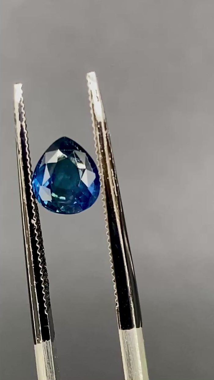 1.05 ct. Sri Lanka Ceylon sapphire pear cut unheated slightly included clarity deep blue with teal undertones available at sanctuaryofstones.com sanctuary of stones dot com, video