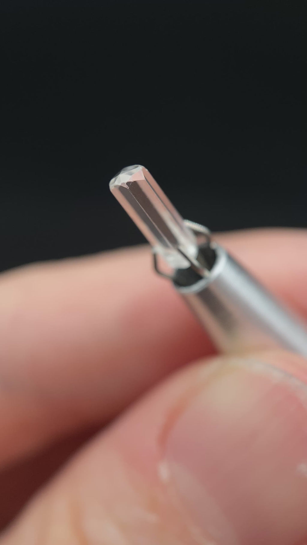 0.595 carat Burmese phenakite drill bit crystal for sale, glass clear, natural termination available at sanctuaryofstones.com video