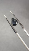 serendibite pear shaped 1.55 carat gemstone, opaque black-blue, very rare gemstone available on sanctuary of stones dot com, sanctuaryofstones.com video1