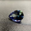 untreated tanzanite pear cut gemstone, 1.88 carats, trichroic color phenomenon with blue, violet, fern-green colors, from sanctuary of stones dot com, image 1