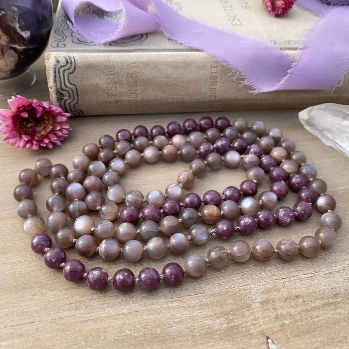 photo 3 of sanctuary vibrational jewelry's Calm Beyond the Veil hand-knotted beaded necklace with natural rutilated taupe moonstone and raspberry lepidolite with mica flecks